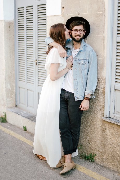 hipster couple kissing in the streets of Arta Mallorca