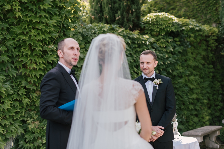 groom looking at bride during ceremony at Villa Grenache