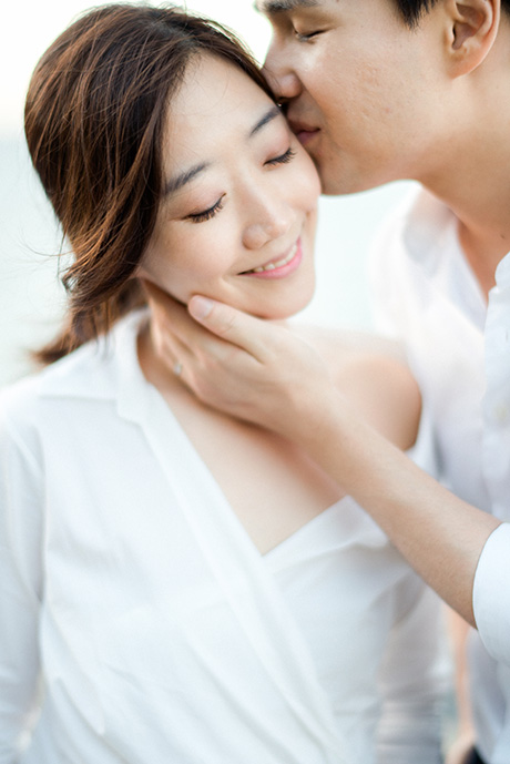 portrait of asian couple during their pre wedding and honeymoon session with mallorca photographer maria hibbs